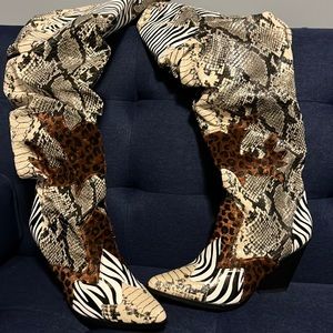 Thigh, high, multi-animal skin boots.
